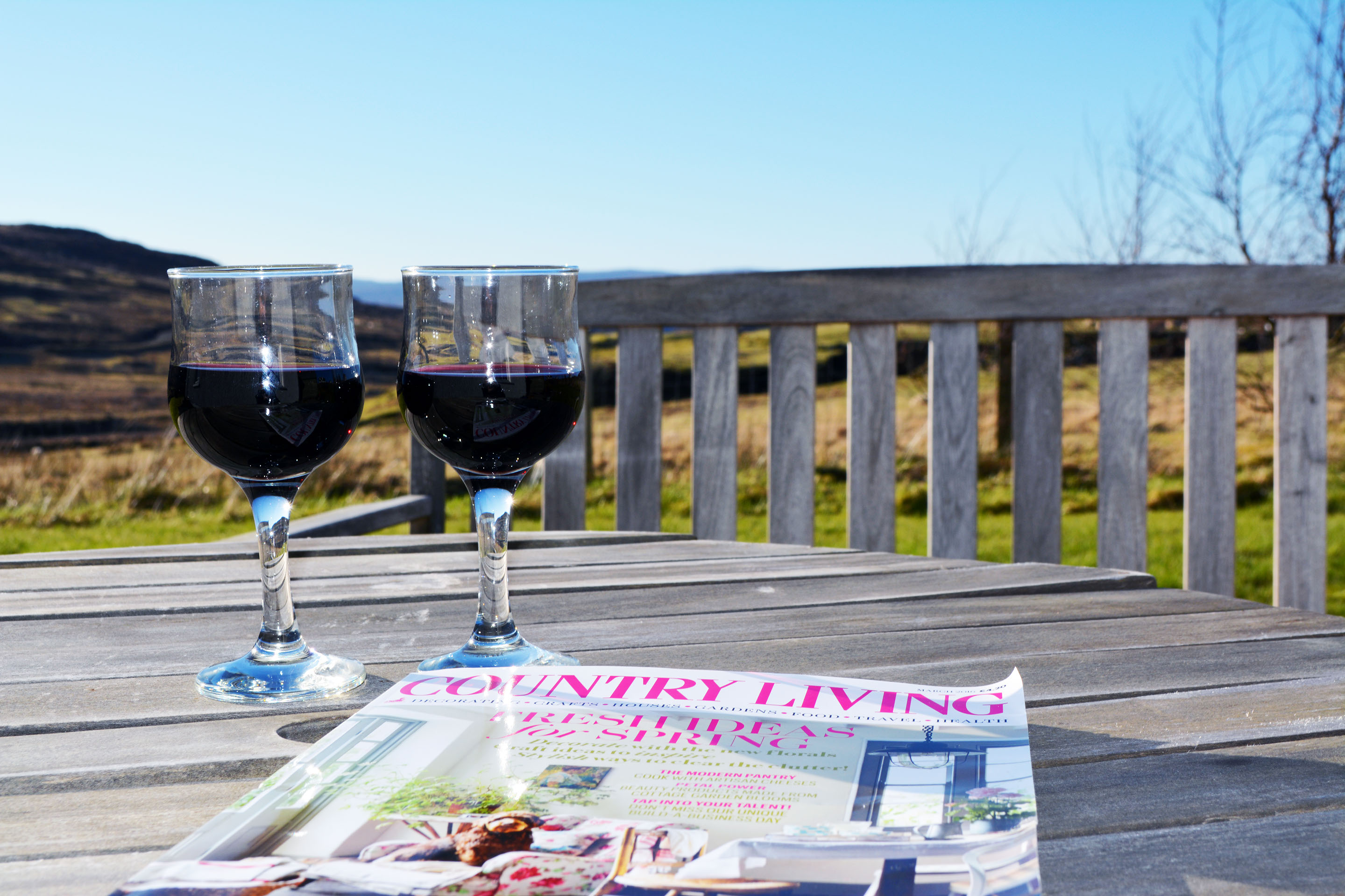 Relax in Taransay House Luxury Accommodation in Portree public seating area with woodburning stove