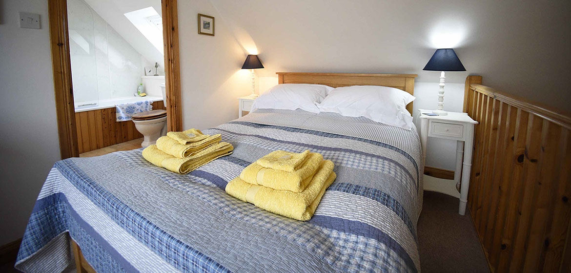Our self catering accommodation in Glenhinnisdal contains a double bedroom with en suite bathroom 