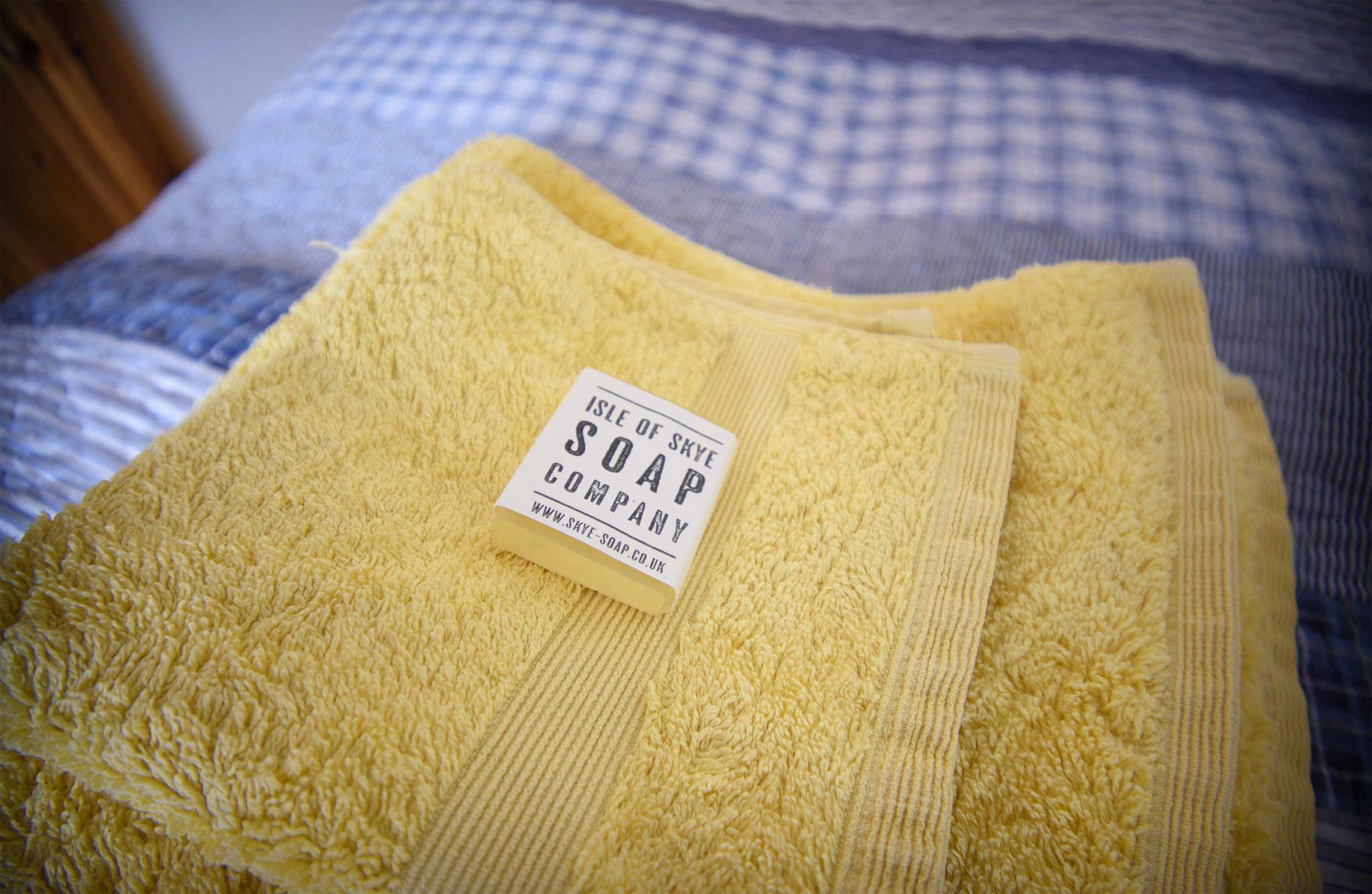 Relax in Taransay House Luxury Accommodation in Portree public seating area with woodburning stove